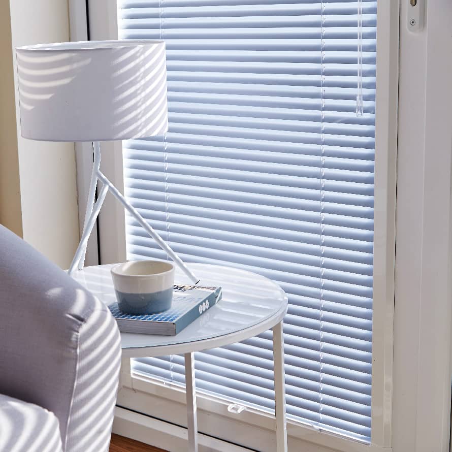 image showing an example of perfect fit blinds in white